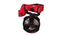 A black fan hanging off a red clamp A black fan hanging off a red clamp