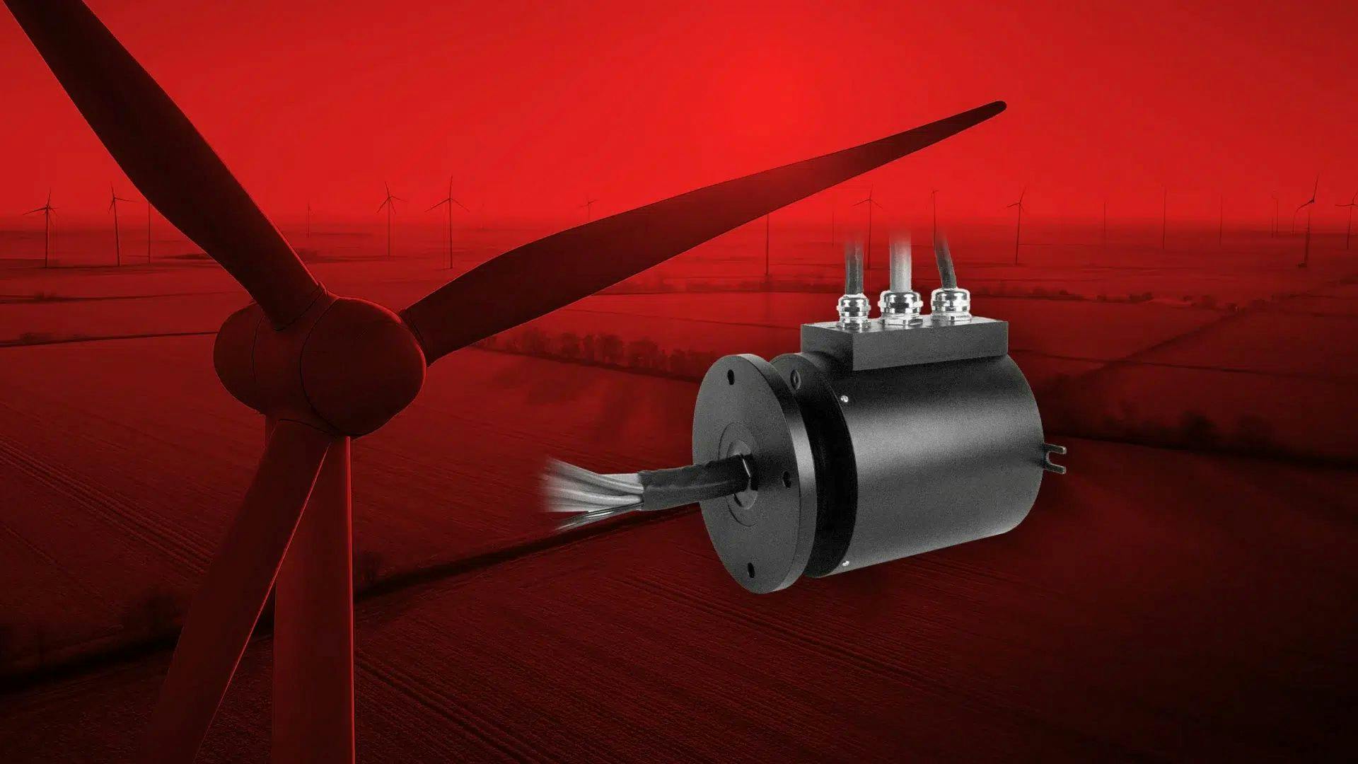 An airplane propeller and a slip ring hovering in the air in front of farmland, with a red haze over the image