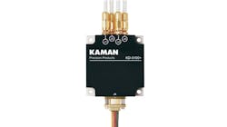 A black and brass piece of equipment with 'KAMAN Precision Products' printedon it A black and brass piece of equipment with 'KAMAN Precision Products' printedon it