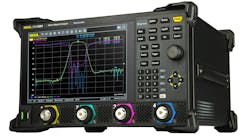 A large black piece of equipment with a screen showing a line graph and various knobs and buttons A large black piece of equipment with a screen showing a line graph and various knobs and buttons