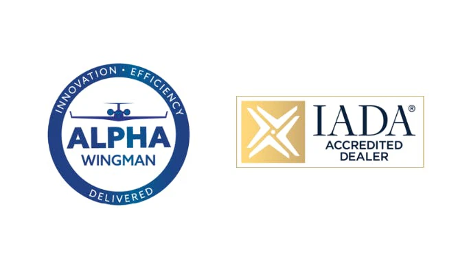 A blue circular logo with text that reads: 'Alpha Wingman Innovation Efficiency Delivered' and a gold logo with black text that reads: 'IADA Accredited Dealer'