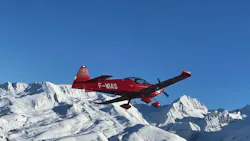 A red airplane flying over snowy mountains A red airplane flying over snowy mountains