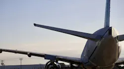 A close-up view of an airplane parked on the ground A close-up view of an airplane parked on the ground