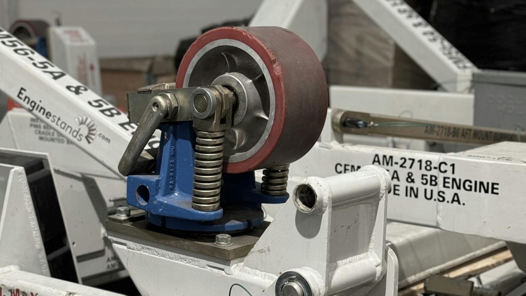 A close-up image of a white engine stand