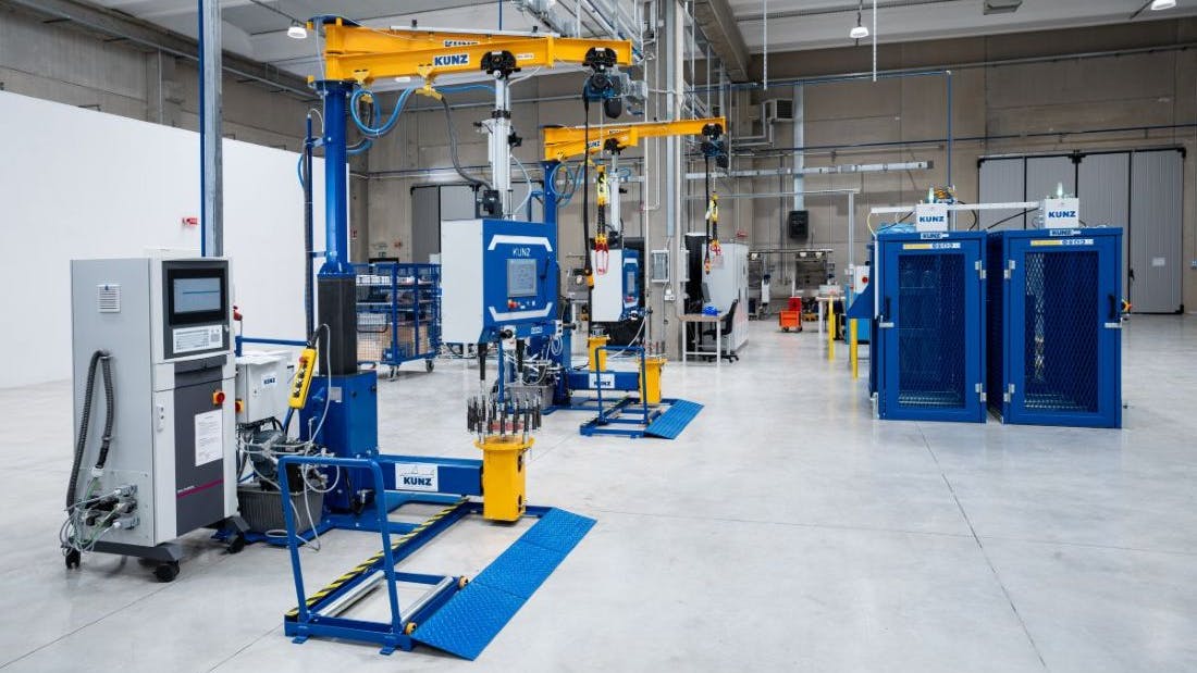 The floor of a repair shop, featuring rows of heavy machinery