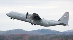 A plane with the words 'U.S. Air Force' on the side flying in the air A plane with the words 'U.S. Air Force' on the side flying in the air