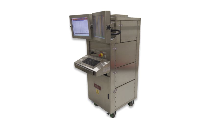 A large piece of metal machinery with a screen, keyboard and compartments