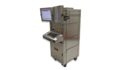 A large piece of metal machinery with a screen, keyboard and compartments A large piece of metal machinery with a screen, keyboard and compartments