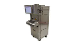 A large piece of metal machinery with a screen, keyboard and compartments A large piece of metal machinery with a screen, keyboard and compartments