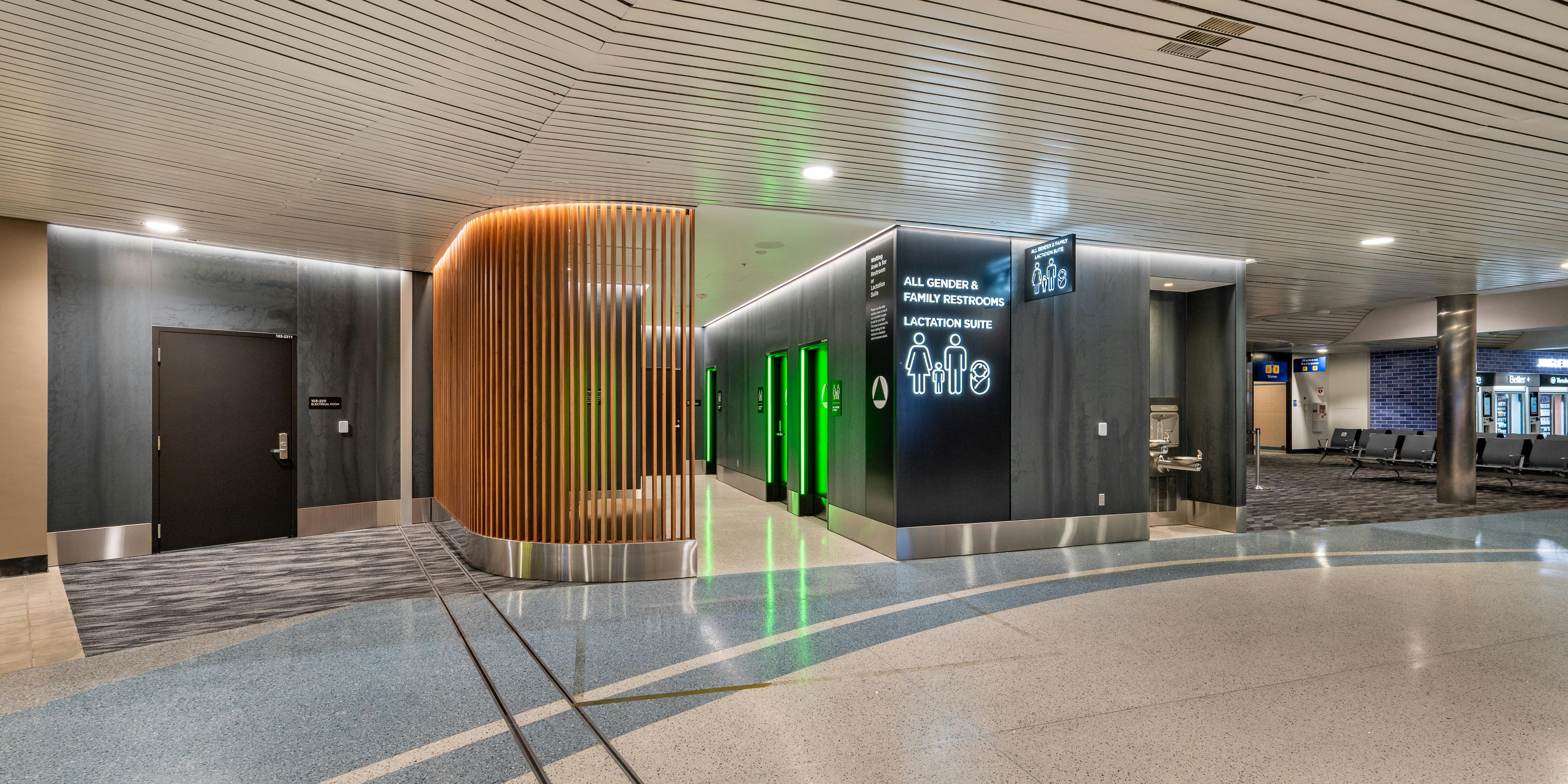 Renovated restroom facilities at Oakland International Airport reflect a hospitality-inspired approach to passenger experience and design.