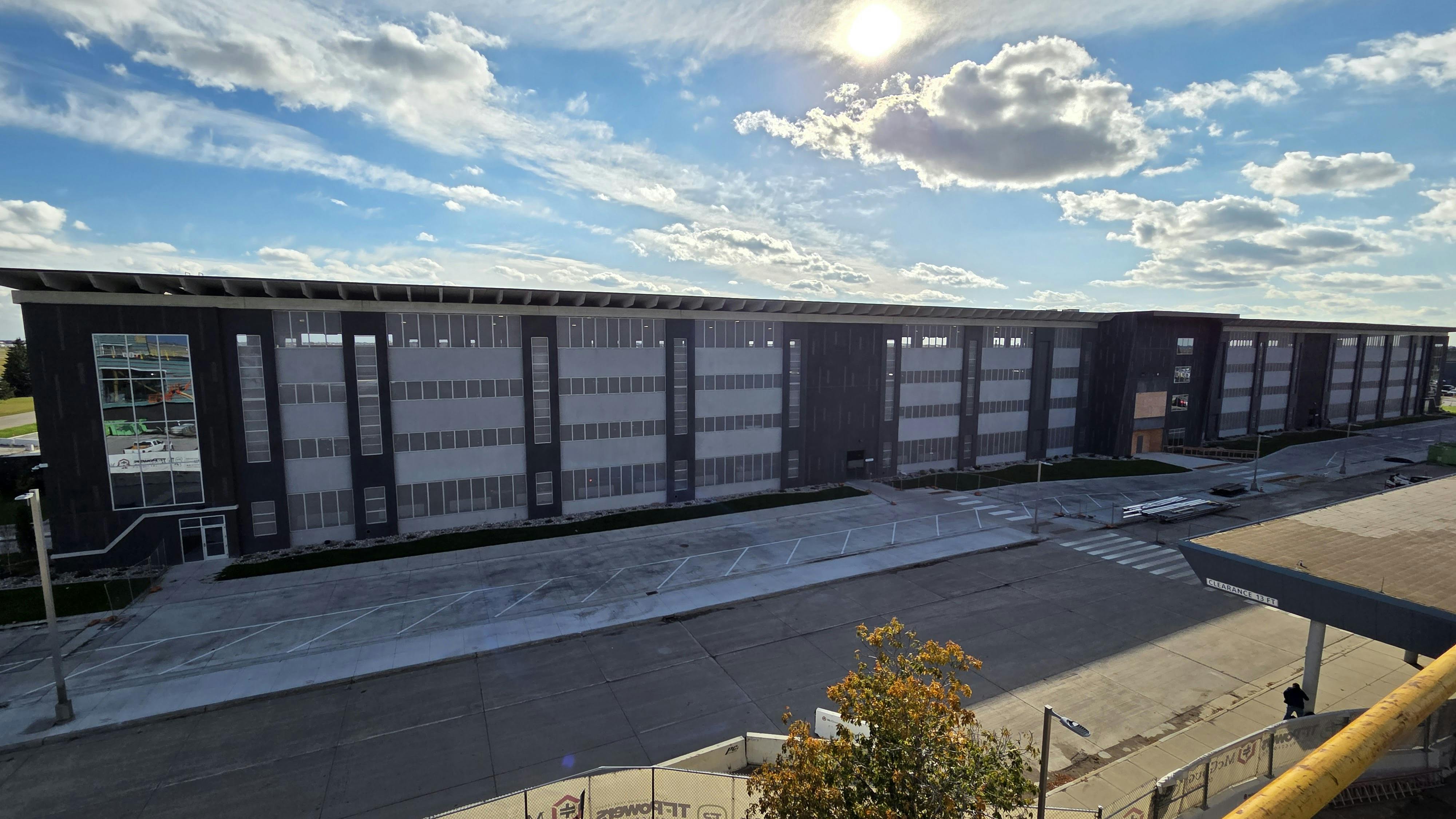 The four-story structure improves access to the terminal and enhances the passenger experience year-round.