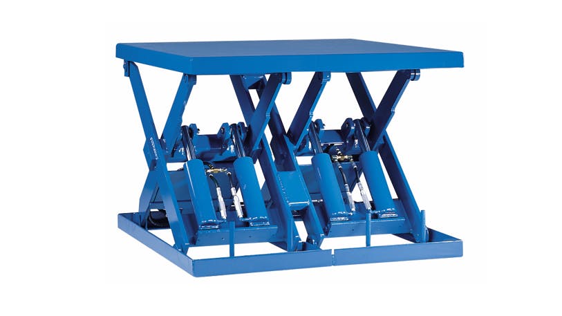 A blue metal scissor lift with hydraulics