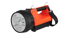 A heavy-duty flashlight with a large bulb and a red body and handle and black base A heavy-duty flashlight with a large bulb and a red body and handle and black base