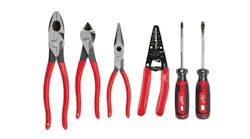 A set of six wire strippers, pliers and screwdrivers with red and black handles A set of six wire strippers, pliers and screwdrivers with red and black handles