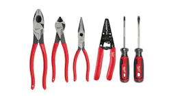 A set of six wire strippers, pliers and screwdrivers with red and black handles A set of six wire strippers, pliers and screwdrivers with red and black handles