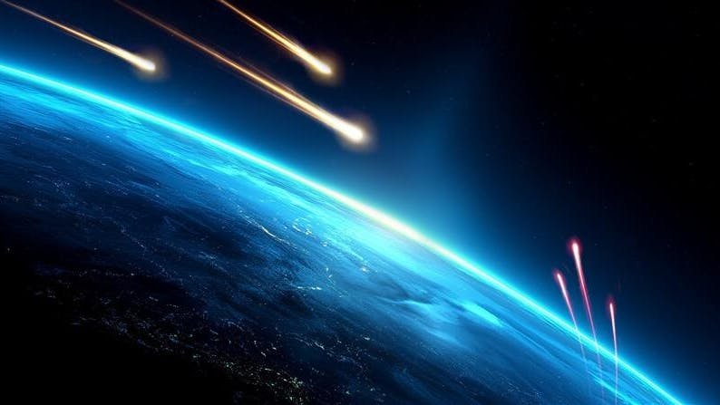 A rendering of Earth shown from space with missiles flying around the atmosphere