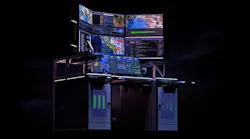 A large computer system with various screens showing geospatial and aviation data A large computer system with various screens showing geospatial and aviation data