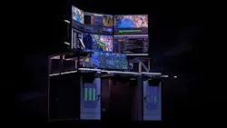 A large computer system with various screens showing geospatial and aviation data A large computer system with various screens showing geospatial and aviation data