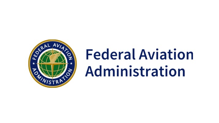 A logo with an illustration of a globe on a white background, with text that reads: Federal Aviation Administration