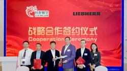 A line of people wearing business attire standing behind a table and holding paperwork while smiling at the camera in front of a backdrop that reads: Cooperation Ceremony Loong Air Liebherr A line of people wearing business attire standing behind a table and holding paperwork while smiling at the camera in front of a backdrop that reads: Cooperation Ceremony Loong Air Liebherr