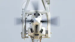 A close-up shot of an aircraft propulsion system, showing the engine and propeller A close-up shot of an aircraft propulsion system, showing the engine and propeller
