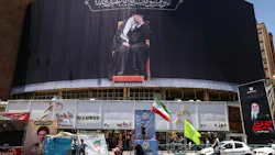 An Iranian woman waves a national flag under a billboard depicting slain supreme leader Ayatollah Ali Khamenei at Valiasr Square in Tehran on June 15, 2026. The United States and Iran agreed a peace deal and an 'immediate and permanent' end to military operations on all fronts including Lebanon, mediator Pakistan said, signaling the apparent end to more than three months of war in Middle East. An Iranian woman waves a national flag under a billboard depicting slain supreme leader Ayatollah Ali Khamenei at Valiasr Square in Tehran on June 15, 2026. The United States and Iran agreed a peace deal and an 'immediate and permanent' end to military operations on all fronts including Lebanon, mediator Pakistan said, signaling the apparent end to more than three months of war in Middle East.
