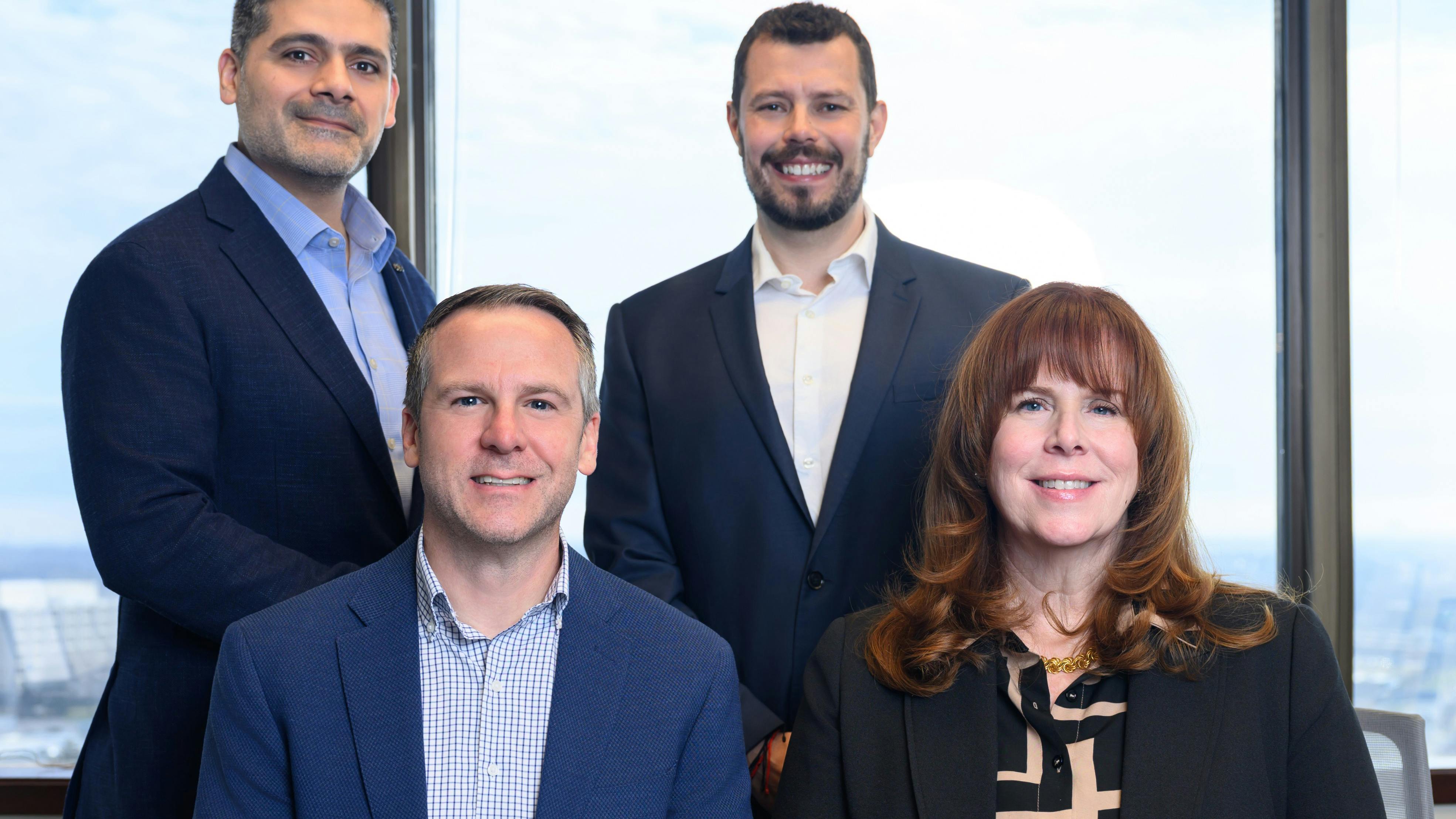 HiSERV President Erin O'Donnell (far right) says HiSERV's management team leverages industry veterans with decades of experience.