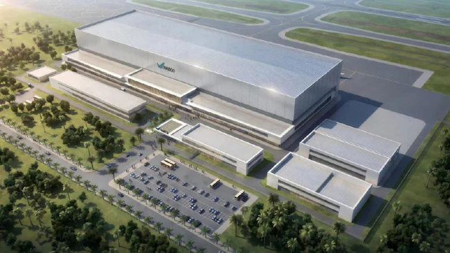 An aerial view of a rendering of a large warehouse-like facility with multiple buildings and a parking lot