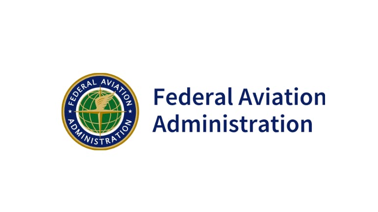 A logo with a white background and an illustration of a globe with text that reads: Federal Aviation Administration