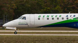 A white airplane with green accents on it and text that reads: DENVER AIR