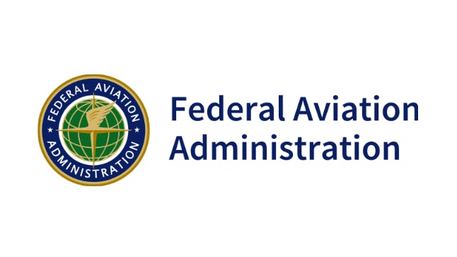 A logo with an illustration of a globe and text that reads: Federal Aviation Administration