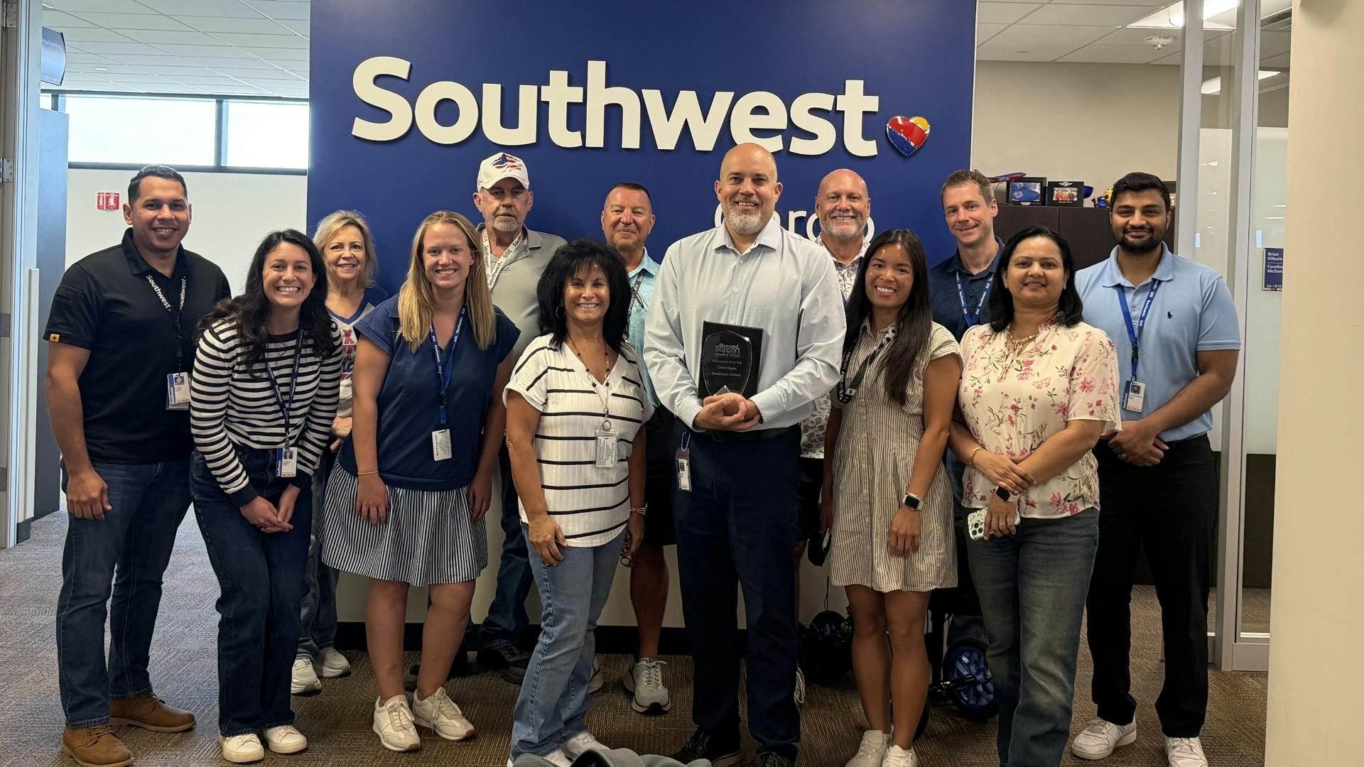 GSW's 2026 Team Leader of the Year award rececipient, Carter Ganns of Southwest Airlines GSE, is shown here with his team and his award.