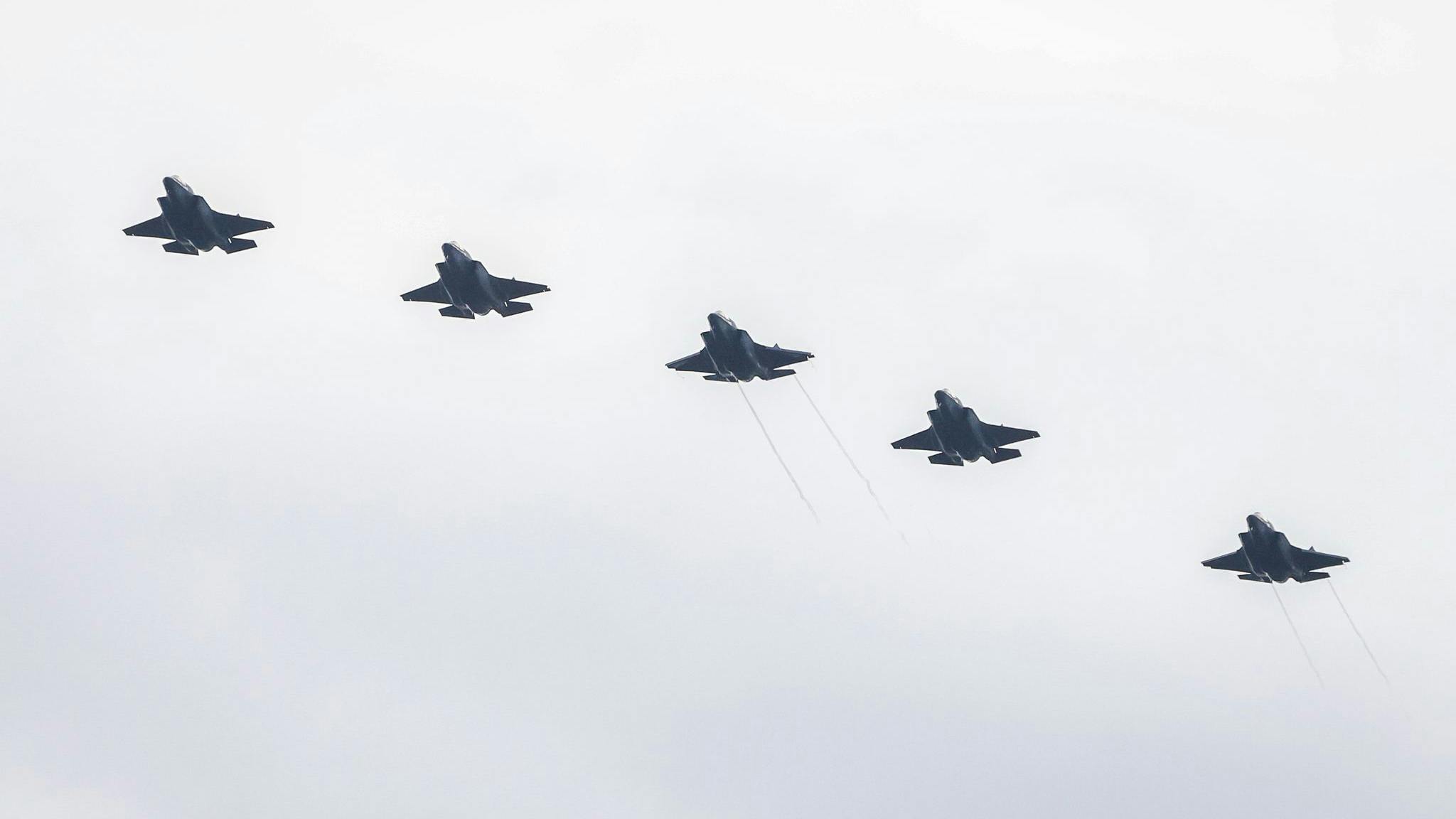 US Marine Corps Lockheed Martin F-35B fighter jets fly over Roosevelt Roads Naval Station.