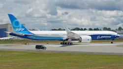 The Boeing 777X taking a test flight. Certification of the 777X passenger version is long delayed, and the jet is not expected to enter service until late next year.