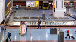Travelers make their way through the baggage claim at Harry Reid International Airport on Tuesday, Nov. 11, 2025, in Las Vegas.