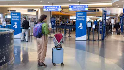 A passenger stands at the Boise Airport in December 2025. The city is searching for the airport’s next leader.