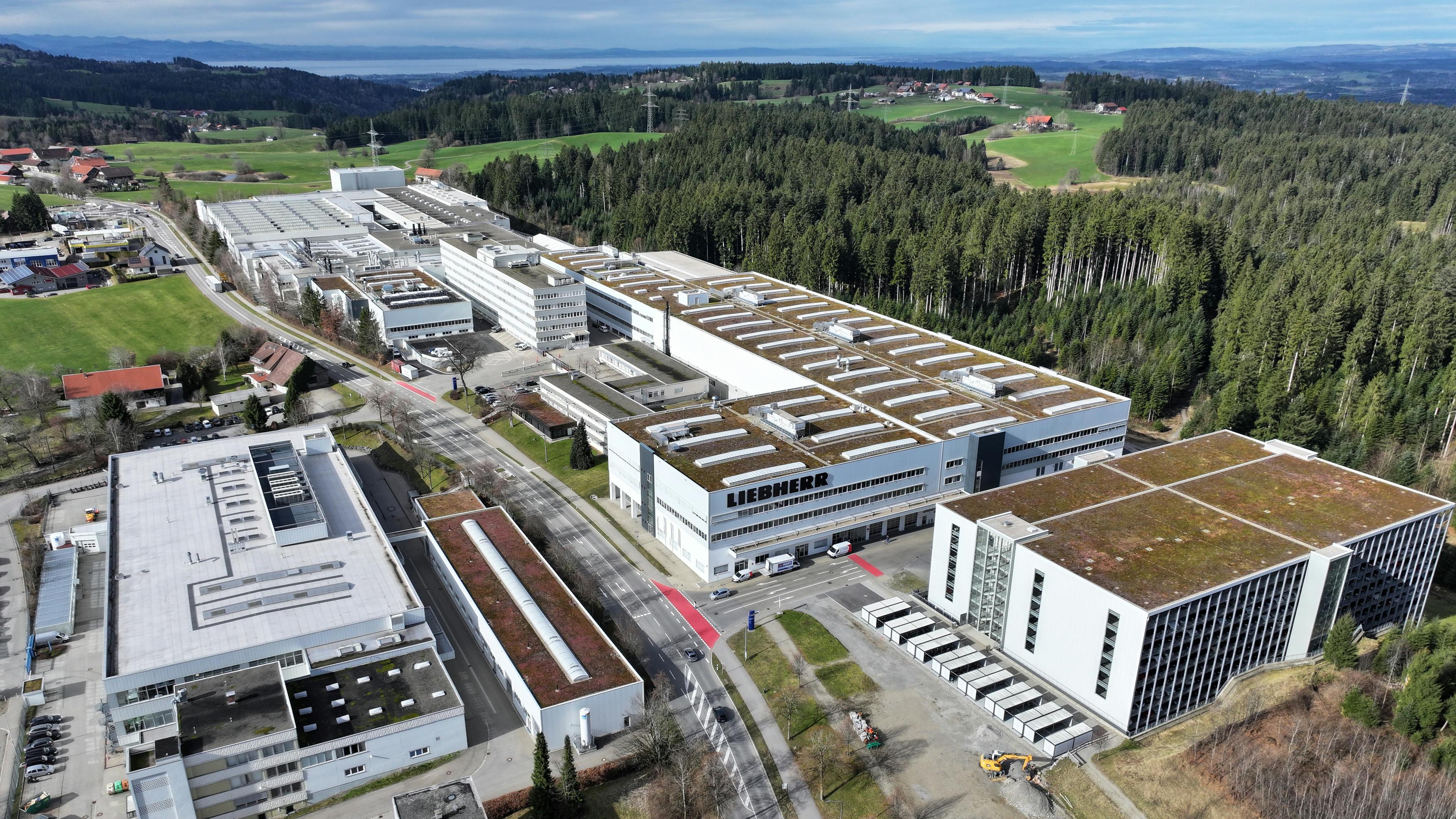 The impressive aerial view of Liebherr-Aerospace Lindenberg GmbH (Germany) reveals the company&rsquo;s modern facilities nestled in the scenic landscape of southern Germany.