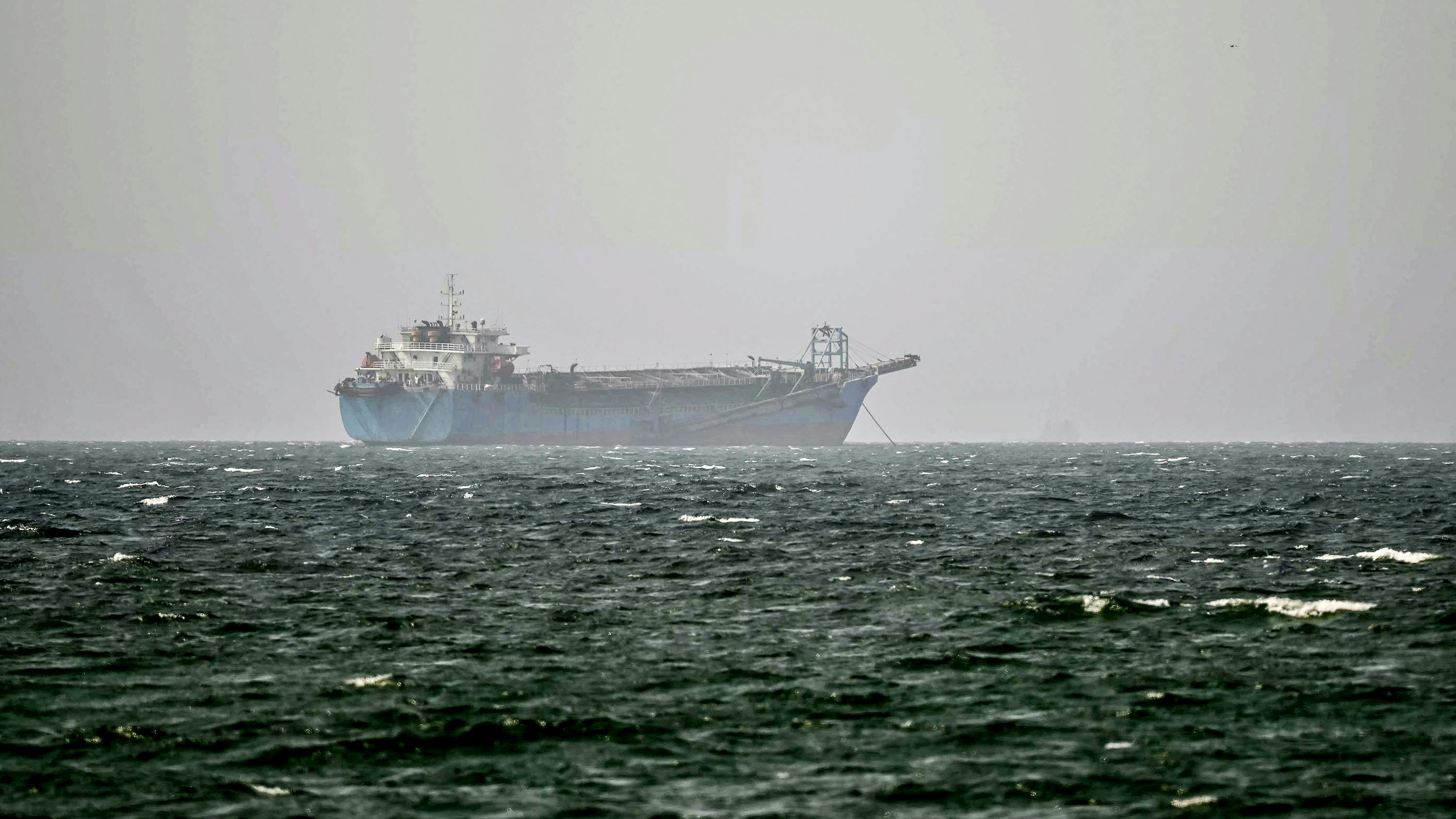 A vessel is anchored off the coast of Sharjah in the United Arab Emirates on Aug. 3, 2026. Iran's foreign ministry said on August 3 there were currently no negotiations with the United States but talks were taking place with Oman on management of the strategic Strait of Hormuz. Iran has kept control of Hormuz since the outbreak of the war in the Middle East on February 28.