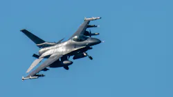 An F-16 Fighting Falcon fighter aircraft extended its landing gear to land at the US military airfield at Spangdahlem.
