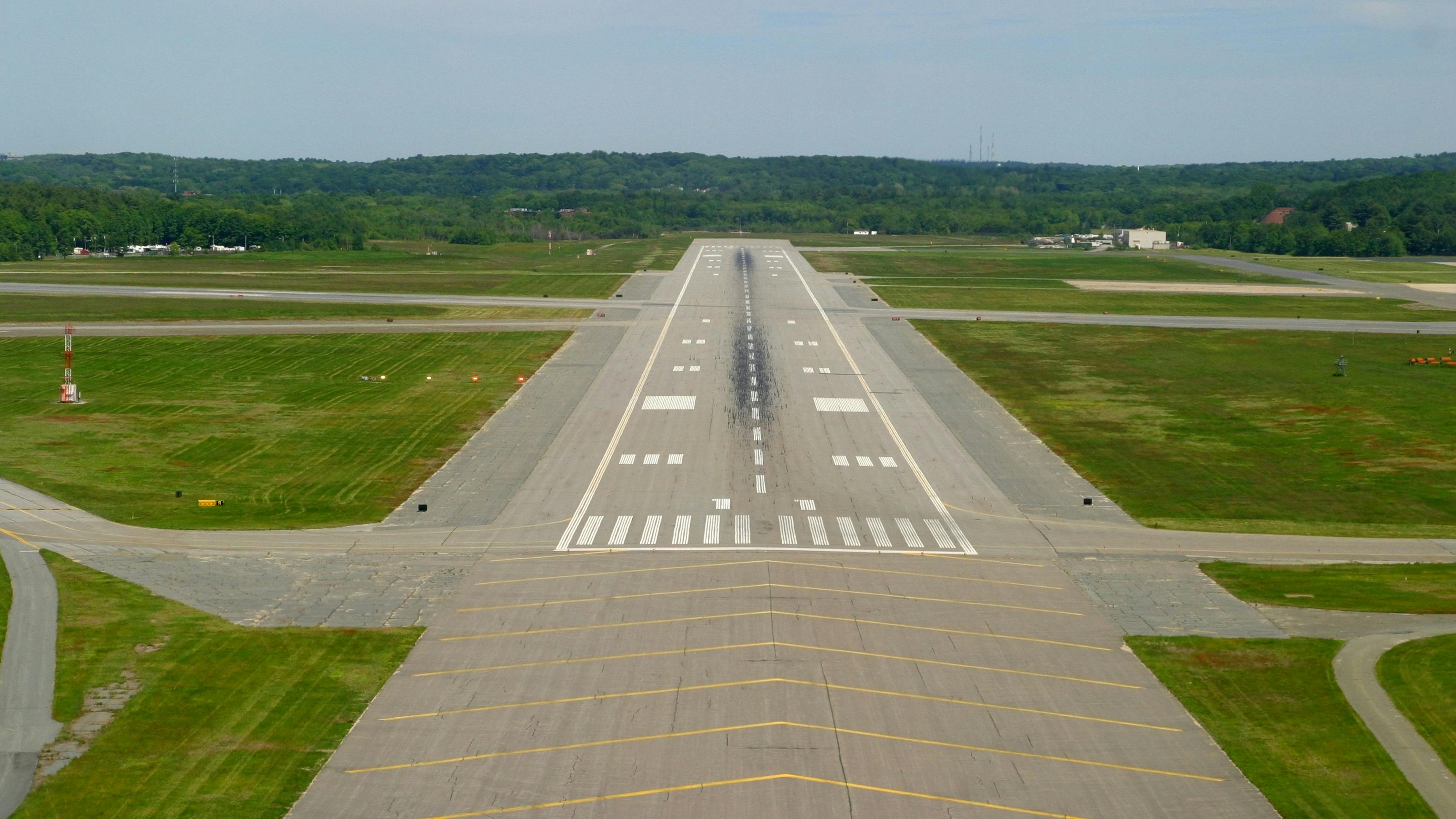 A wide aerial shot of an airfield at an airport