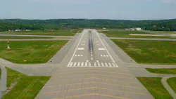A wide aerial shot of an airfield at an airport