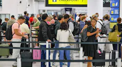 Travelers navigate TSA lines at Miami International Airport in March 2026.