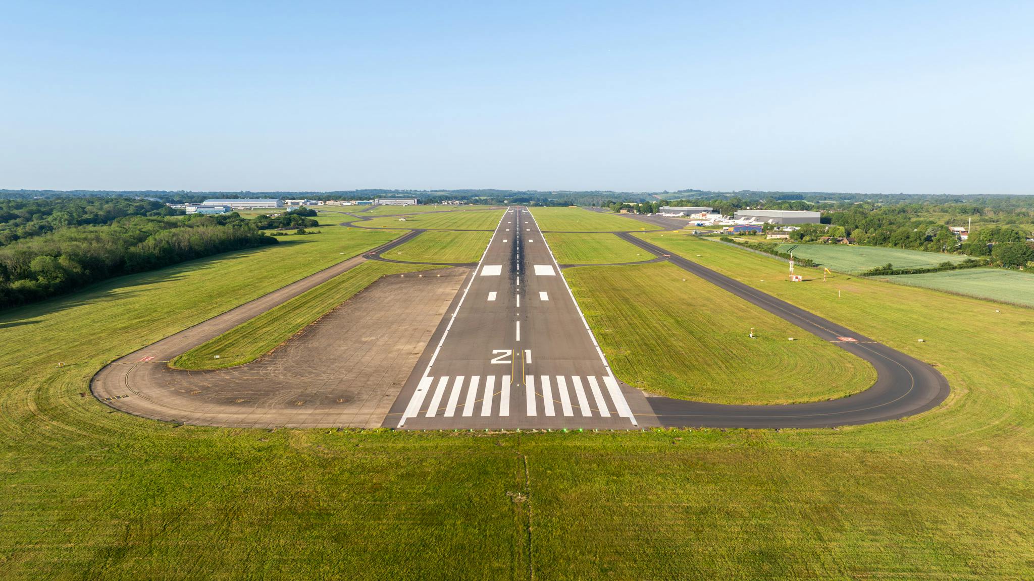 An aerial shot of an airport runway
