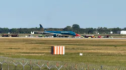 A Vietnam Airlines plane is pictured after it landed back at Munich Airport shortly after takeoff (best possible quality). An airport spokesperson said damage to the tires and landing gear had been detected.