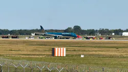 A Vietnam Airlines plane is pictured after it landed back at Munich Airport shortly after takeoff (best possible quality). An airport spokesperson said damage to the tires and landing gear had been detected.