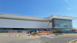 A view of the side of the new Mobile International Airport terminal on Aug. 19, 2026, shows that work on exterior cladding has progressed.