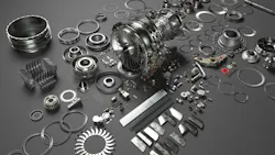 A collection of metal parts on a gray table