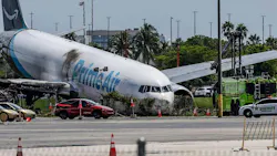 Investigators continue working on Tuesday, Sept. 8, 2026, after an Amazon Prime Air Boeing 767 went through a fence and hit vehicles at Miami International Airport on Sunday. Five people were killed.