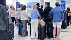 Passengers queue at Gatwick Airport in Crawley, amid disruption following a system issue at Nats, which provides air traffic control services to 15 UK airports. Cancellations and delays are expected as airlines deal with the knock-on effects of flights cancelled to and from UK airports on Tuesday.