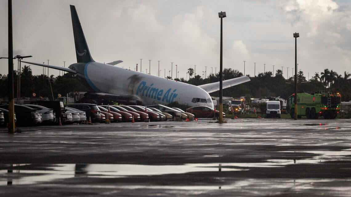 The crash site and responders on Monday, Sept. 7, 2026, of the Amazon Prime Air Boeing 767 at Miami International Airport in Miami, Fla.